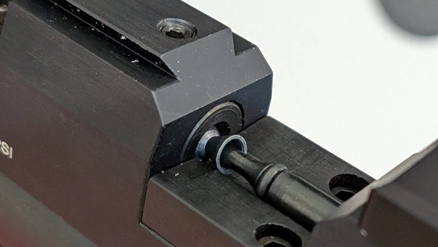 Misaligned pellet caught at the barrel entrance in the Crosman 1701P breech