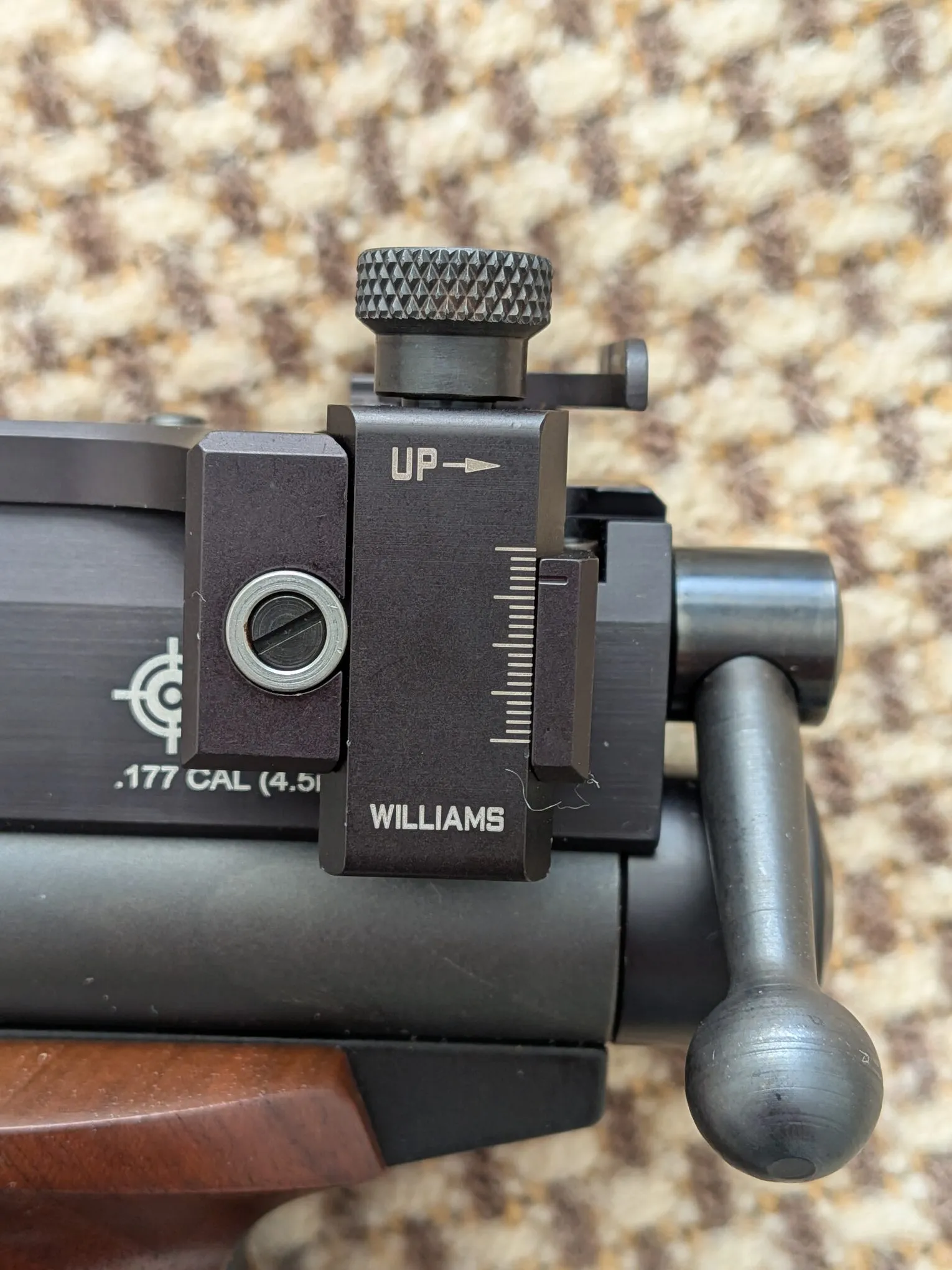 Williams rear sight showing the elevation knob and reference scale
