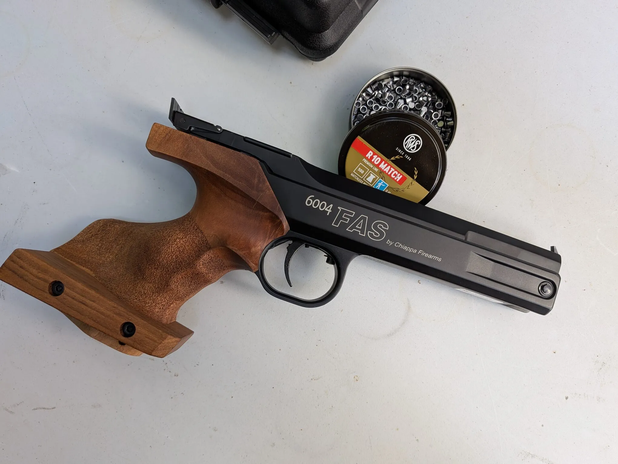 FAS 6004 with the medium-size match grip and adjustable palm shelf, shown on the right