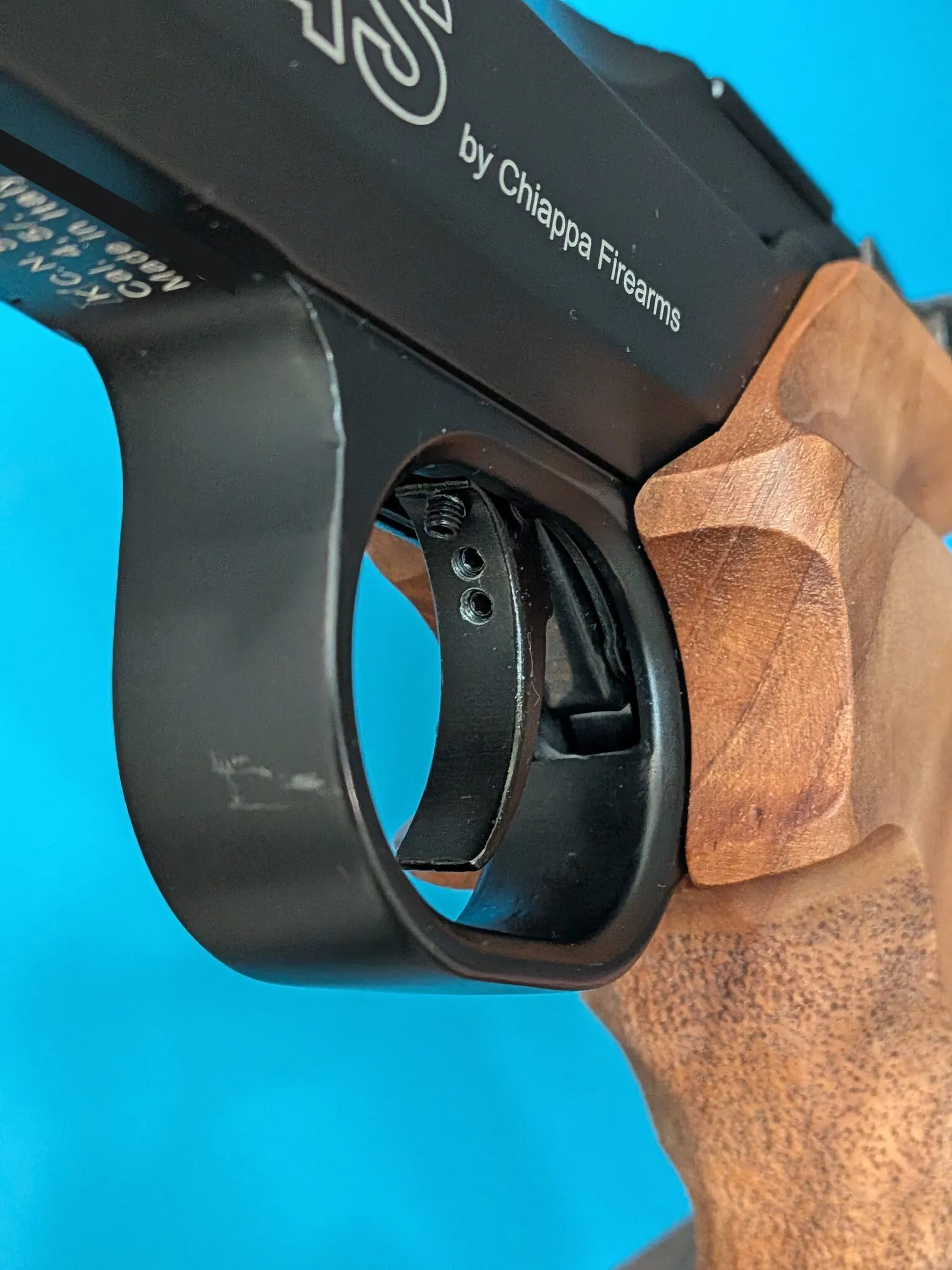 Oblique view of the FAS 6004 trigger blade, showing its rear face and adjustment screw openings