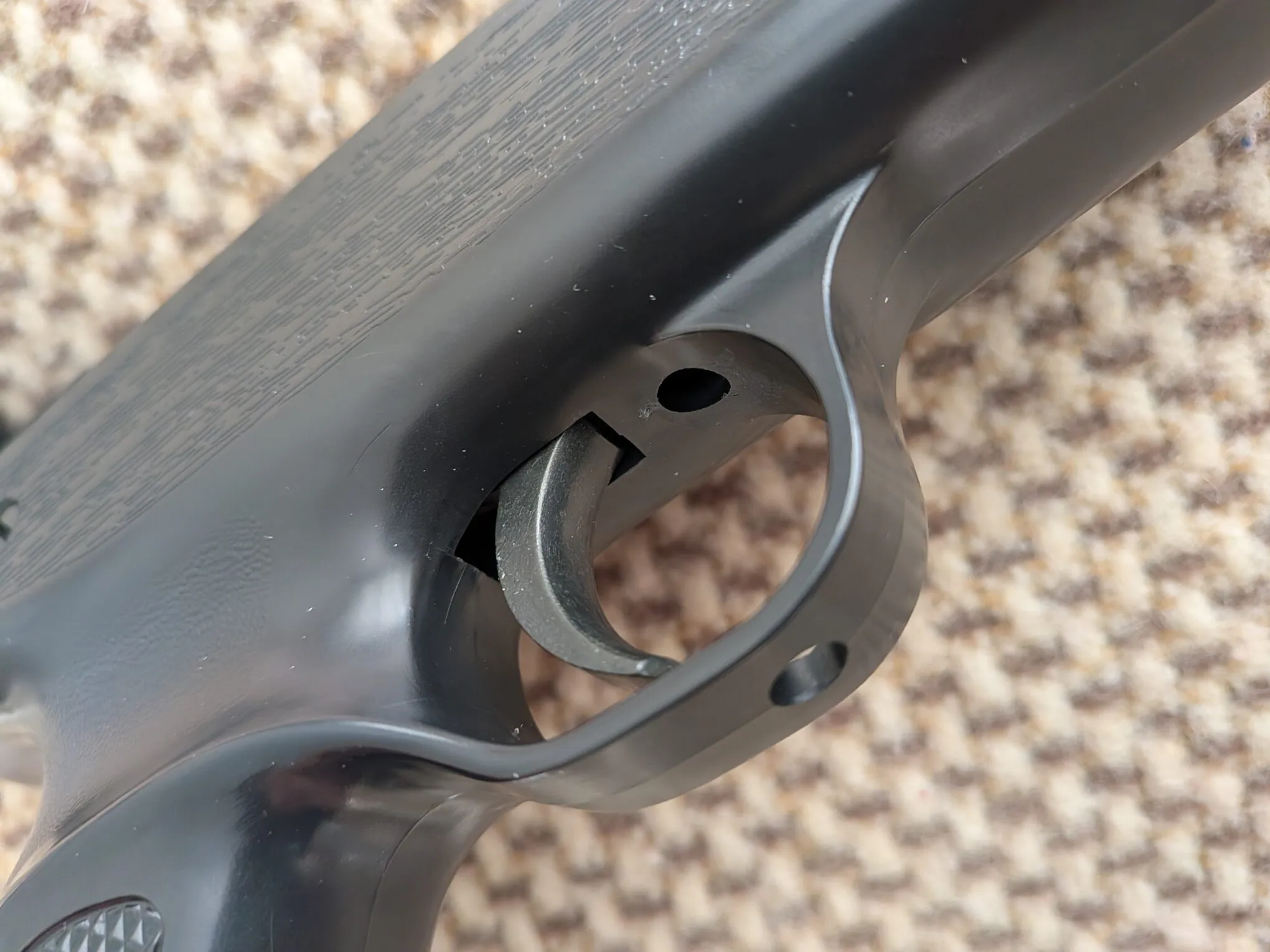 Close-up of the HW70A polymer trigger blade and integral trigger guard