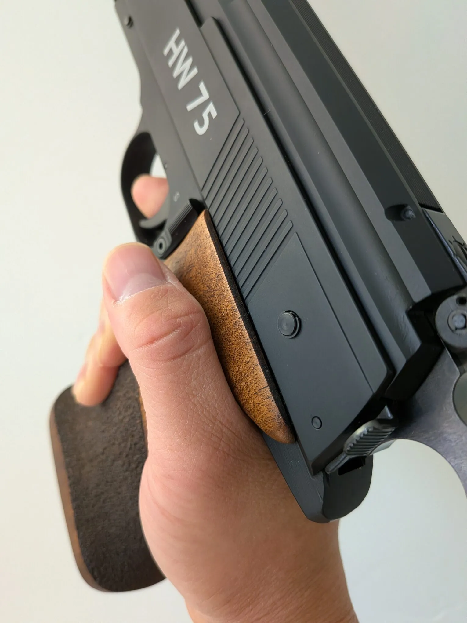 Angled rear view of the HW75 grip, showing how the upper contour meets the hand