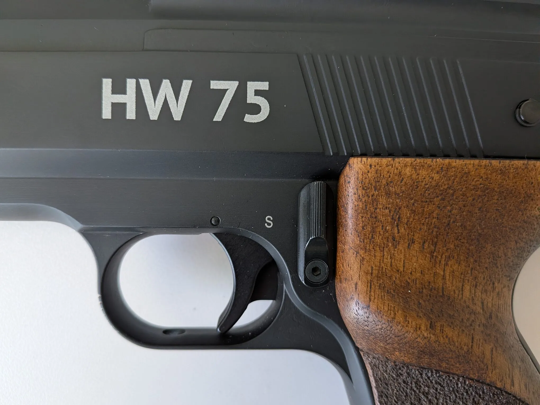 HW75 safety engaged, with the lever upright and the S marking visible