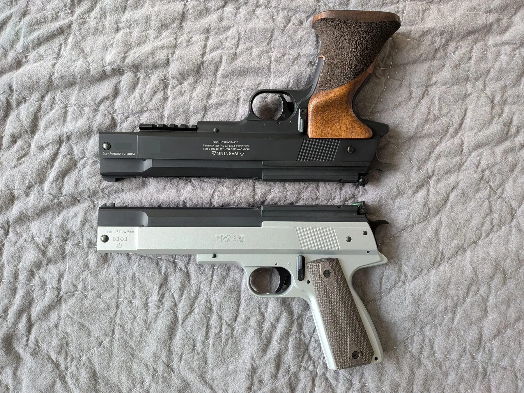 HW75 above a silver-and-black HW45, showing their closely matched frame profiles
